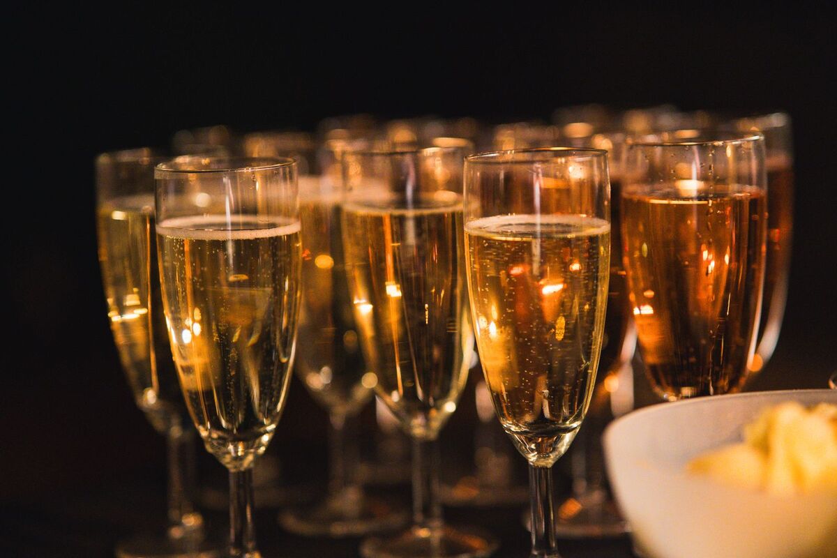 Champagne glasses lined up for a toast